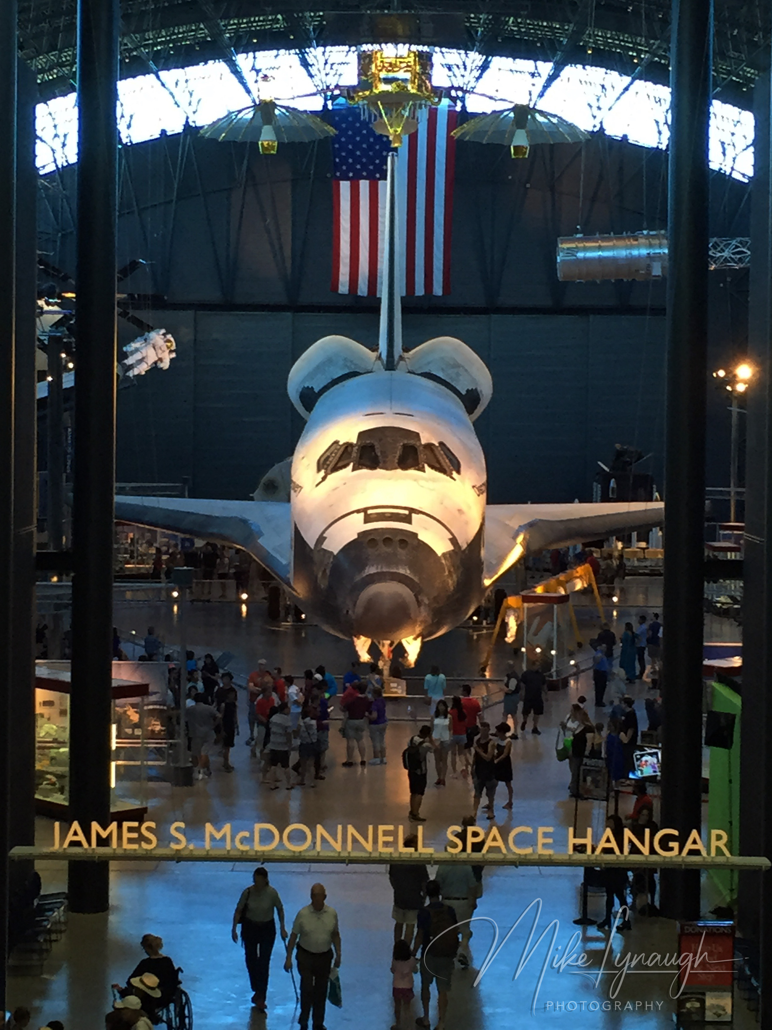 A vertical interior photograph looking down the entrance of the James S.